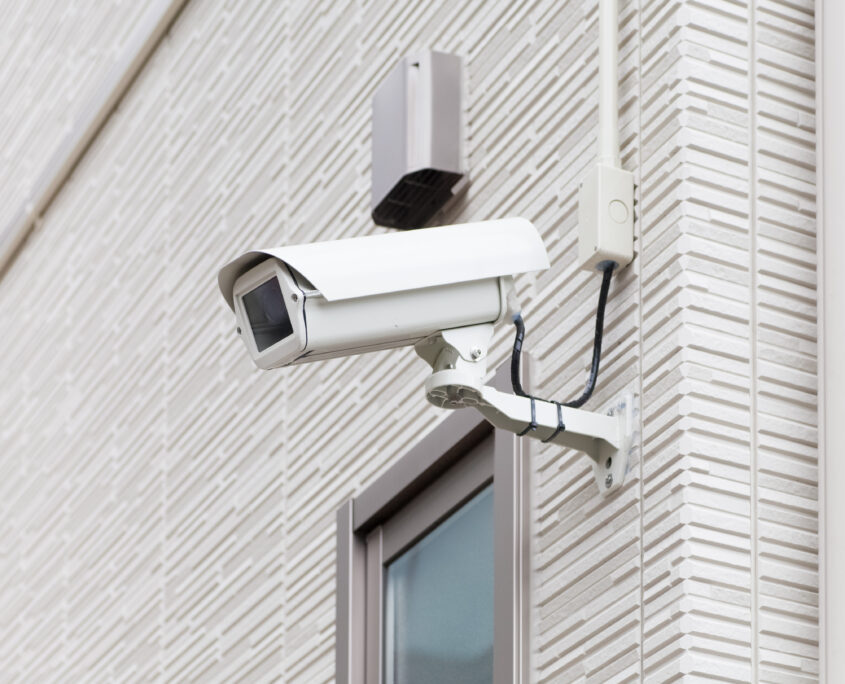 Video camera security system on the wall of the building